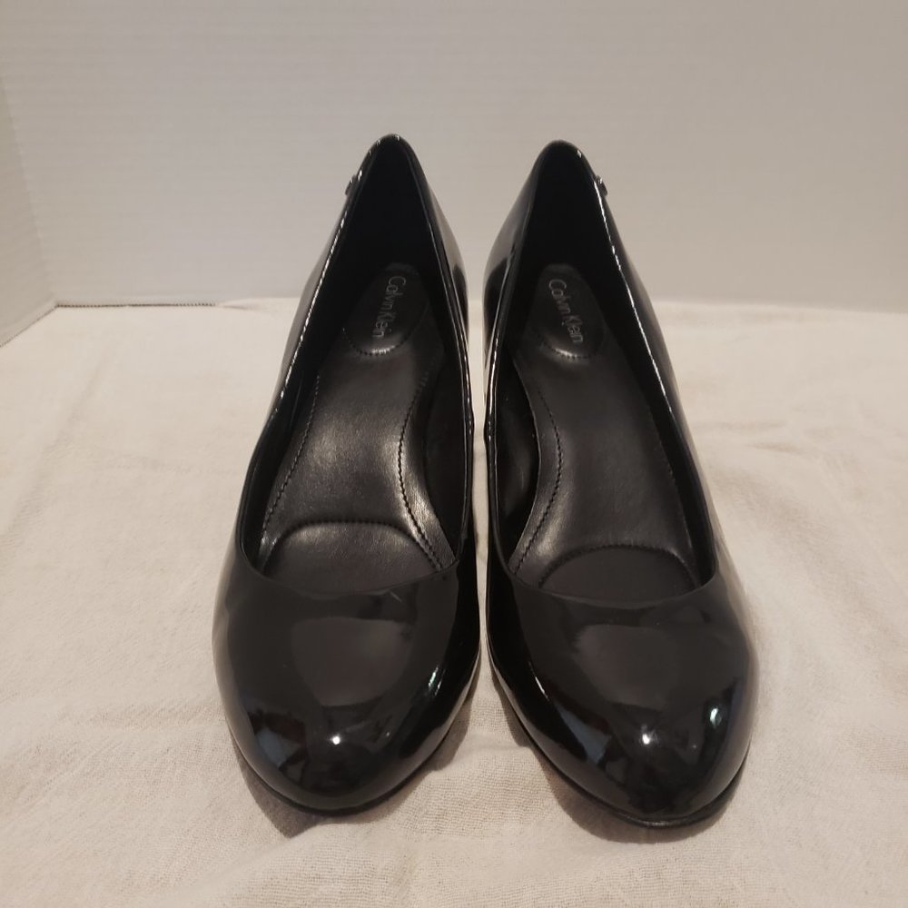 Calvin Klein Black patten Wedges size 8.5